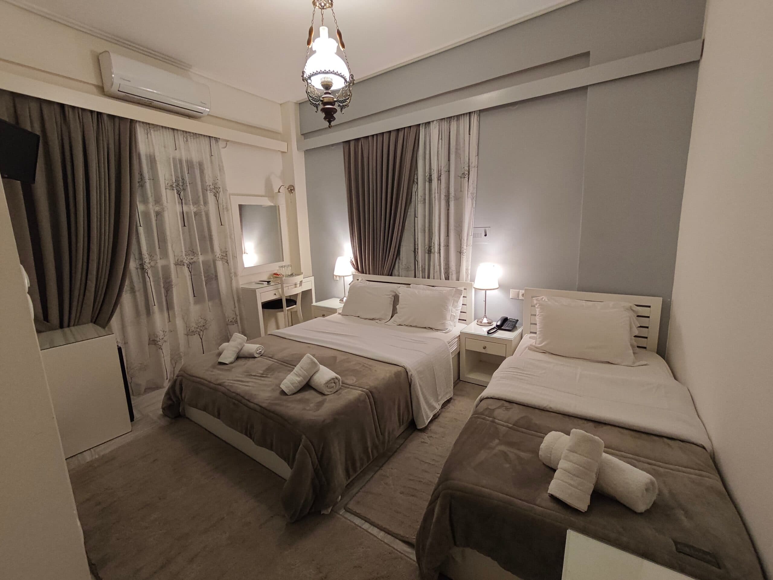 A top-floor guest room made up for arrival